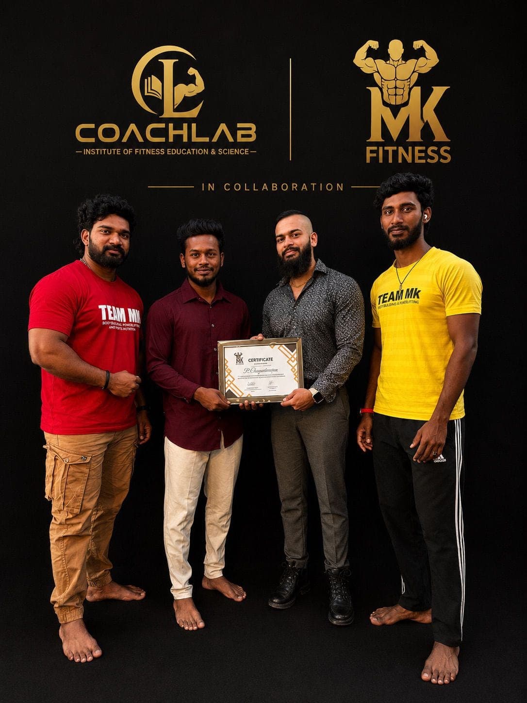 A CoachLab graduate presented with a certificate in front of the CoachLab backdrop.